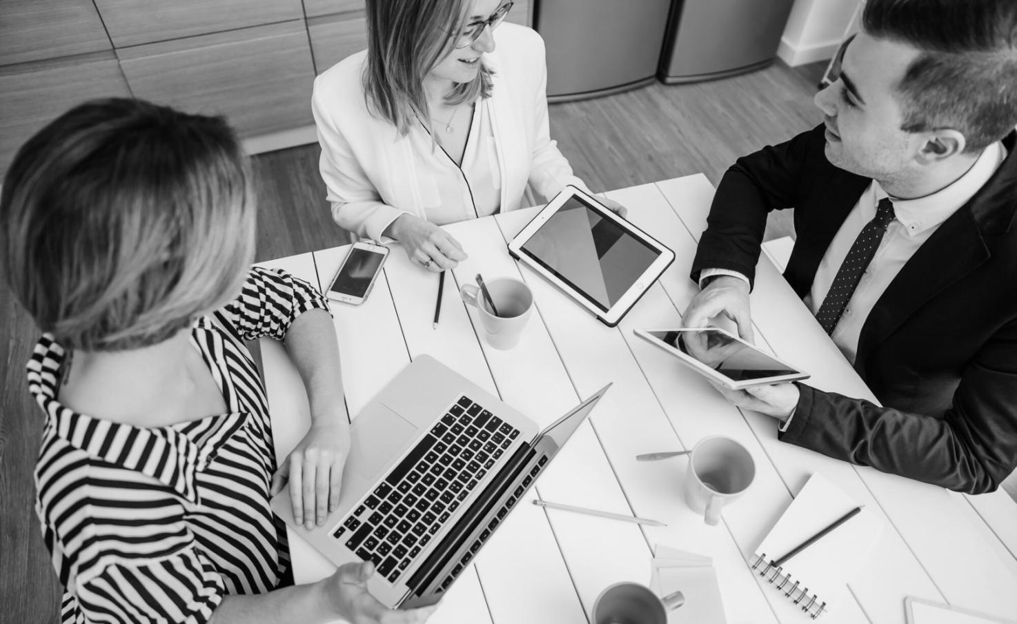 Startup founders reviewing financial projections and investment documents