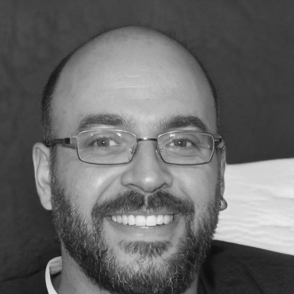 Professional headshot of team member