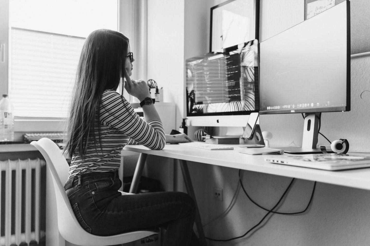 Collaborative workspace with entrepreneurs working on financial planning and business development